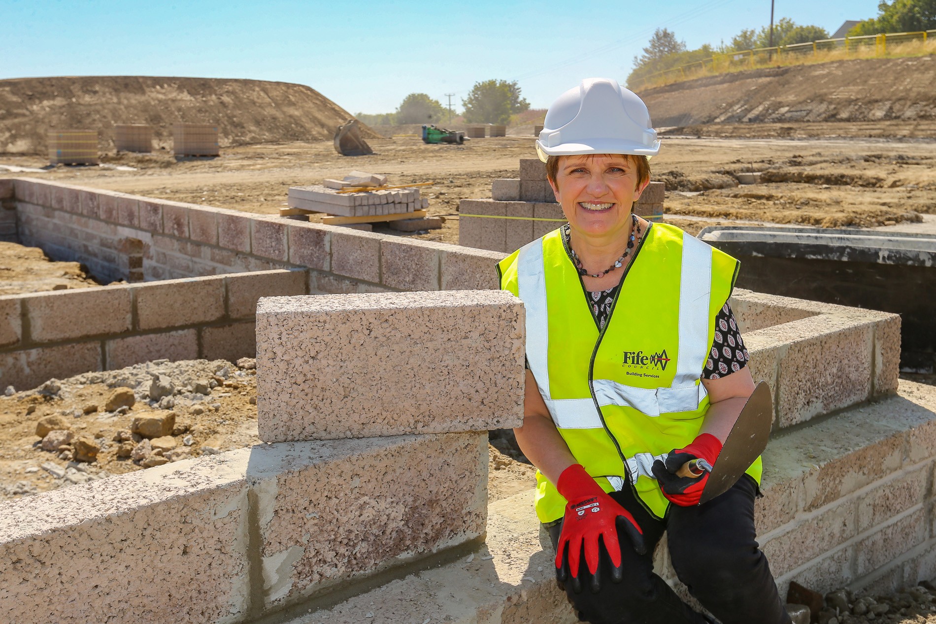 Cllr Judy Hamilton on building site