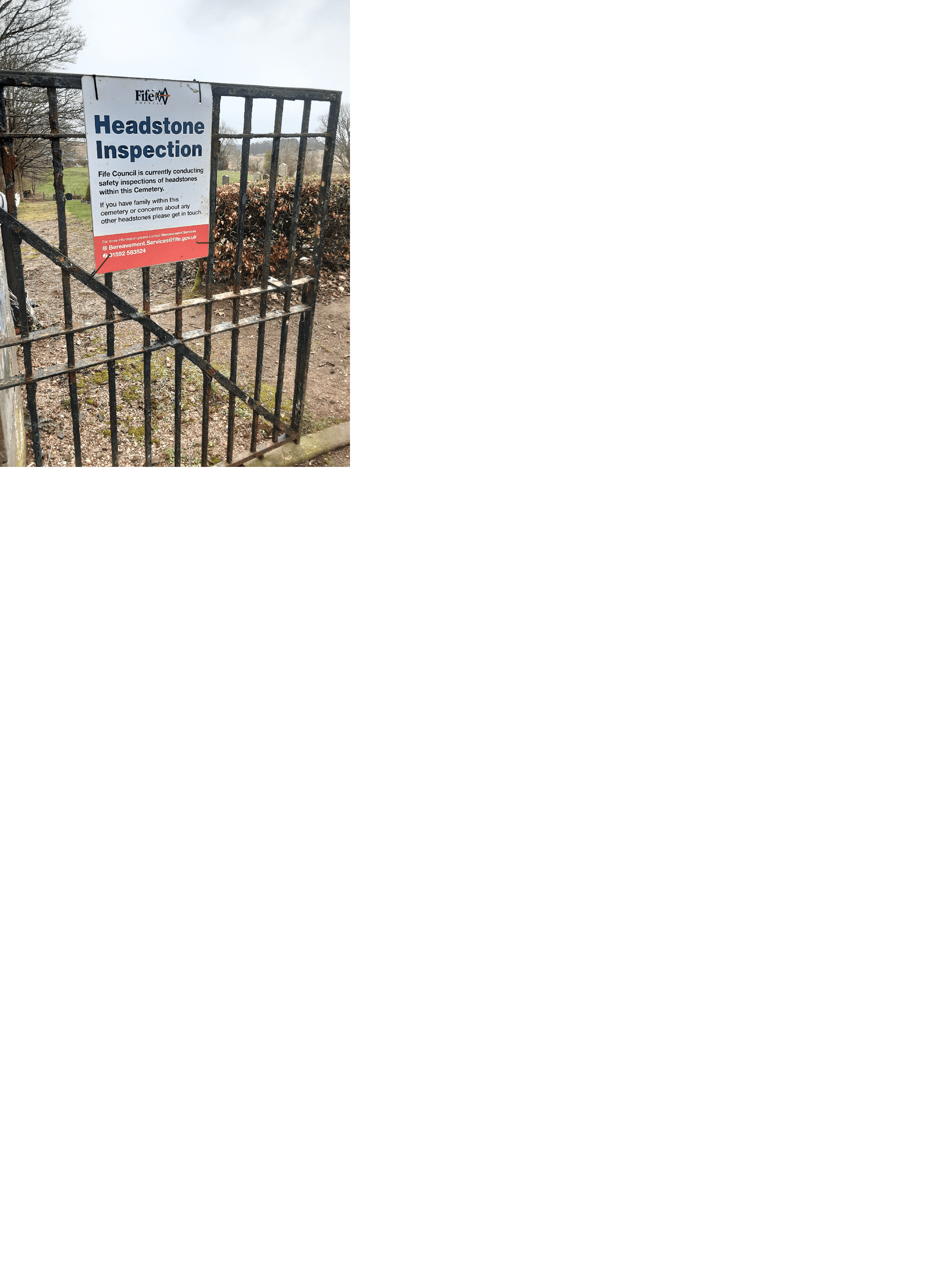 Notice on cemetery gates advising of headstone inspections taking place