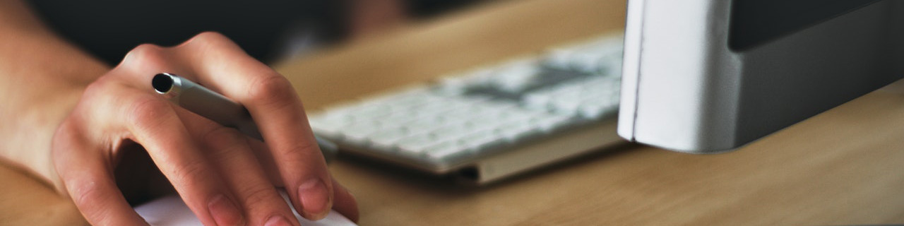 A close up of a person using a computer