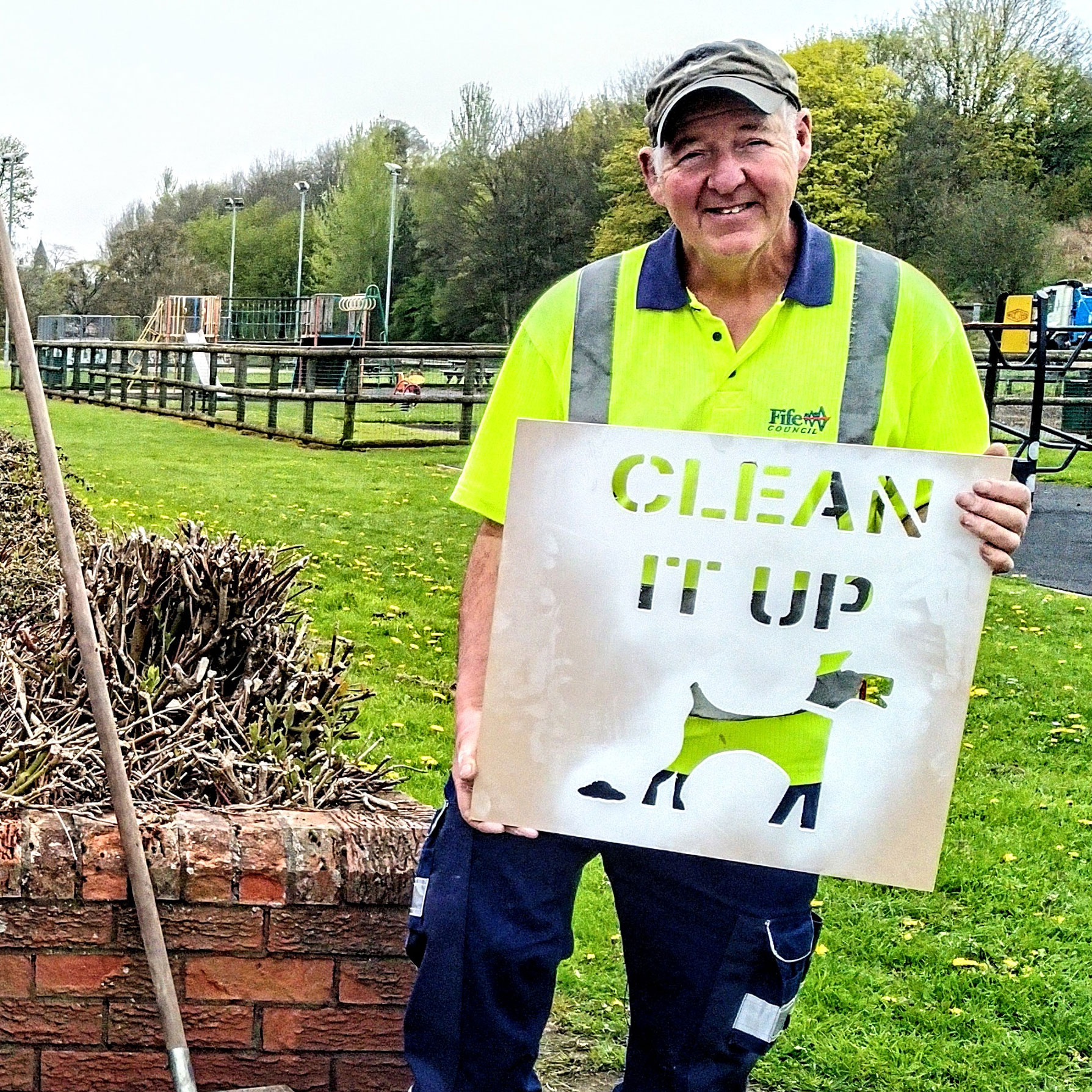 Jim Peebles, Street Cleansing Operative holding Clean It Up template