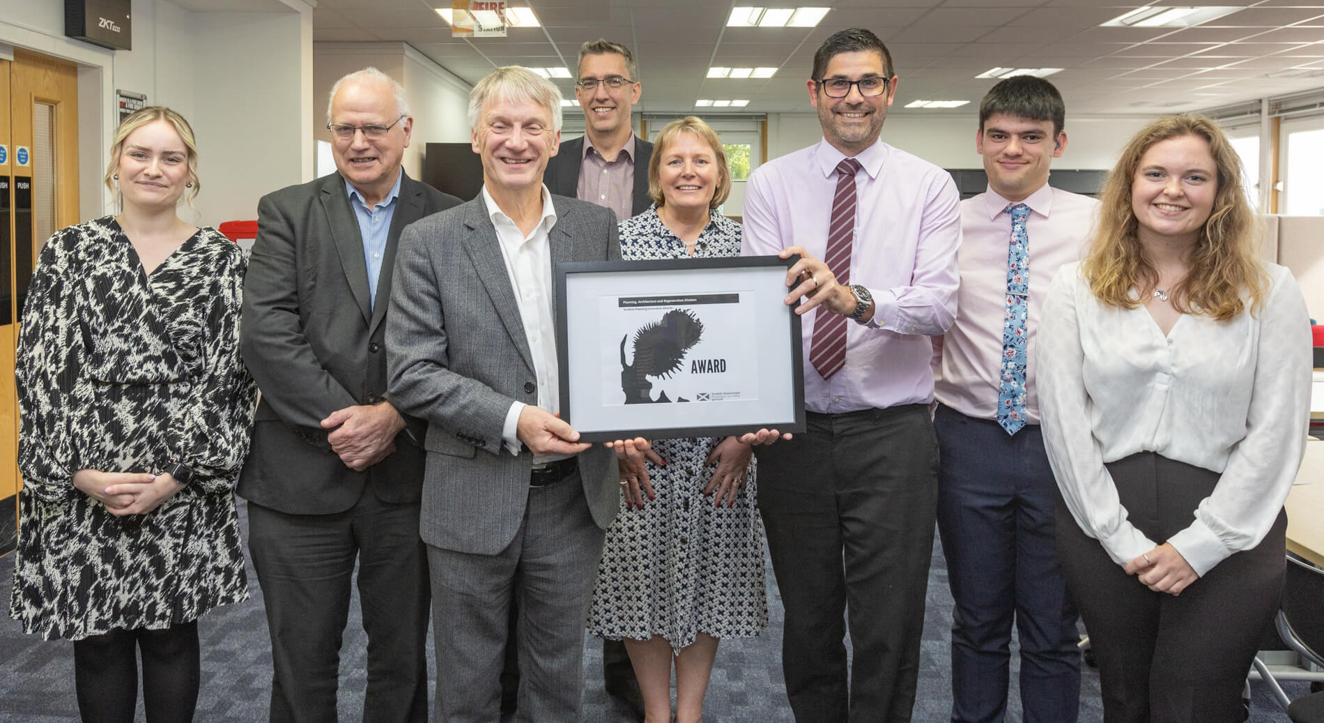 Fife Council planners receive an award from Ivan McKee, Minister for Public Finance