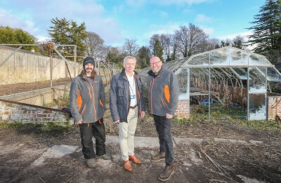 Photo of three people at the Walled Garden at Ravenscraig Park, Kirkcaldy
